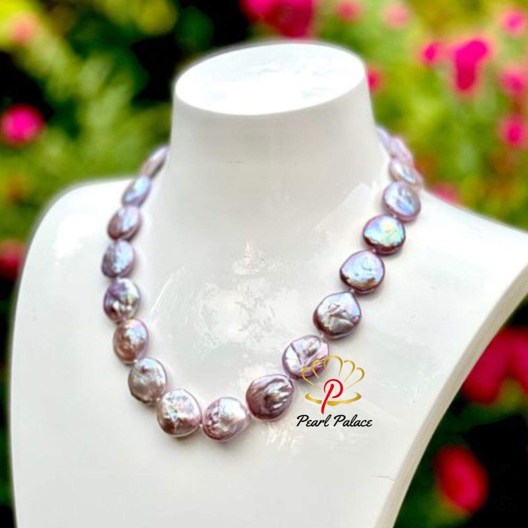 A magnificent, and very rare tone of large Freshwater Baroque Coin pearls